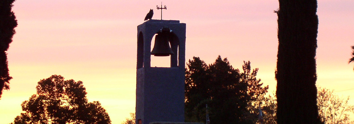 Picture of Bell Tower with Sunset Background at Mountain View Cemetery.
